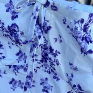 Milk Maid Brand new purple floral dress, corset style with sleeves . Size lg